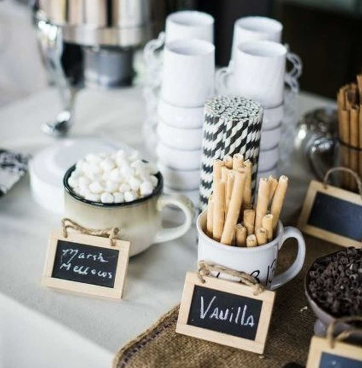 An inviting coffee bar set up with mugs and coffee sticks, perfect for outdoor wedding venues in NJ.